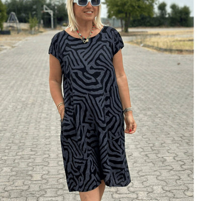 Solena™ Flow Dress – Stijlvol, Comfortabel en Vakantieproof