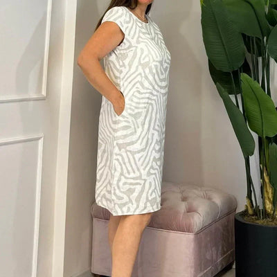 Solena™ Flow Dress – Stijlvol, Comfortabel en Vakantieproof