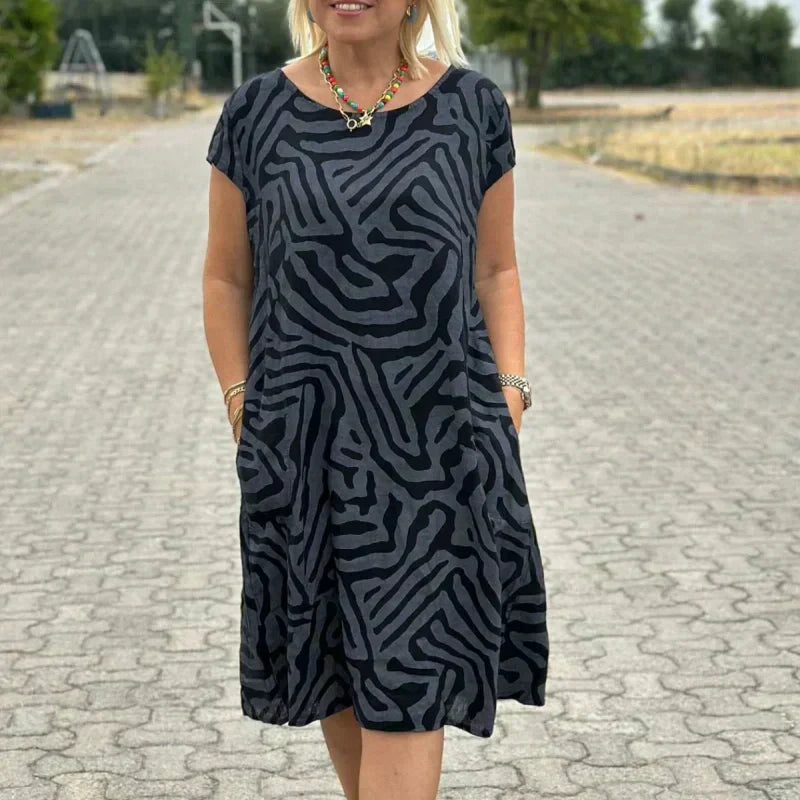 Solena™ Flow Dress – Stijlvol, Comfortabel en Vakantieproof